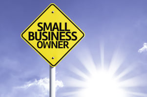 Small Business Owner road sign with sun background